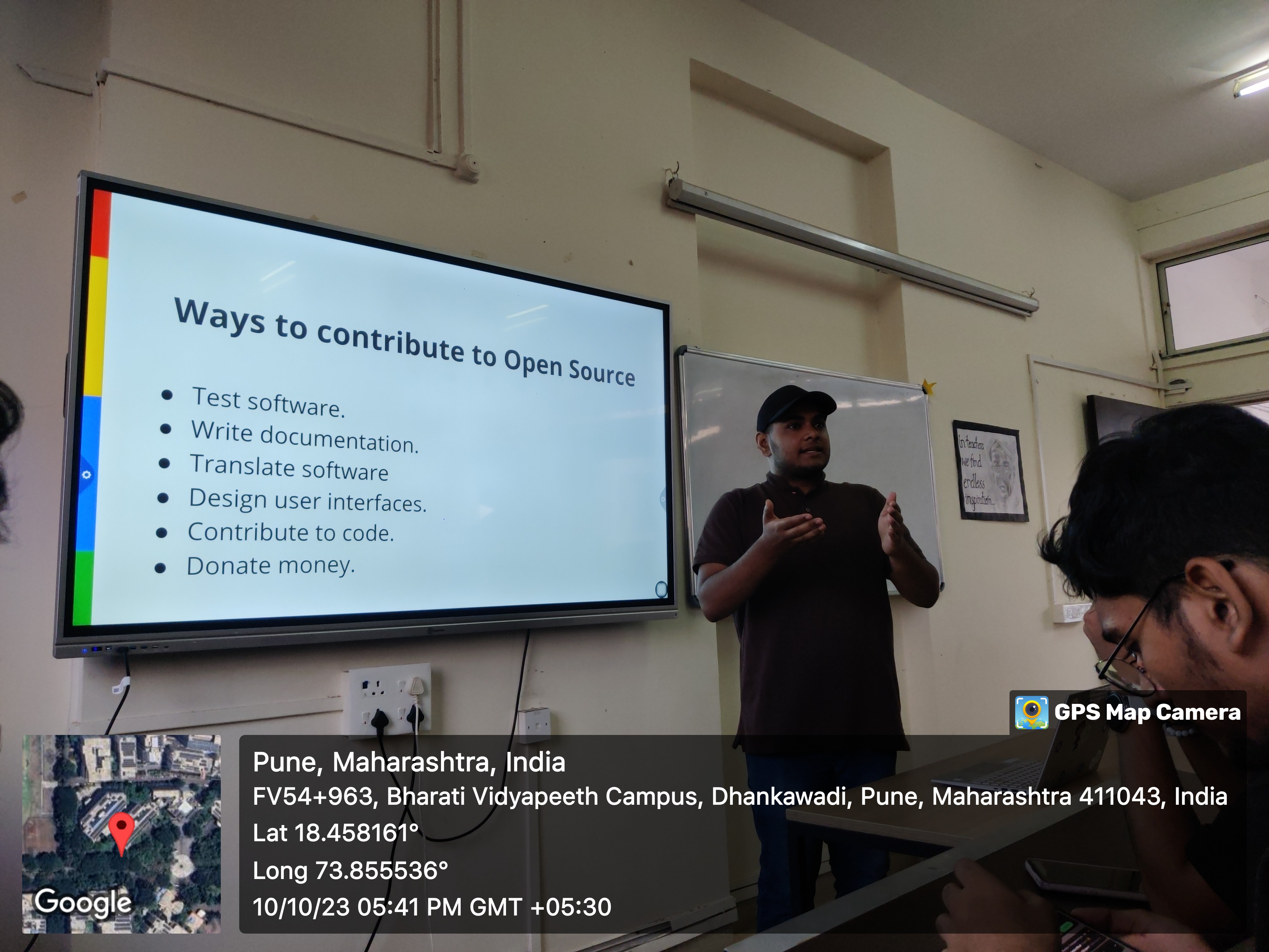 a cat sleeping under a duvet